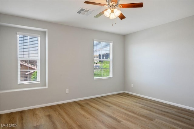 9136 Cocowoods Pl, Las Vegas, NV 89148 - spare room with light wood-type flooring and ceiling fan