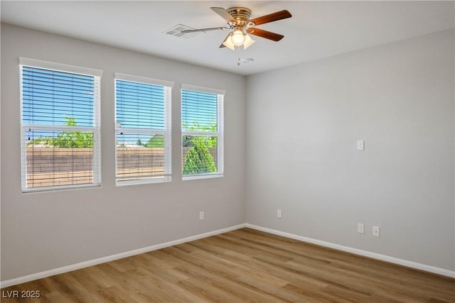 9136 Cocowoods Pl, Las Vegas, NV 89148 - spare room with light wood-style flooring and a ceiling fan