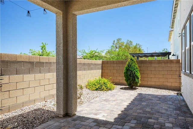 9136 Cocowoods Pl, Las Vegas, NV 89148 - fenced backyard with a patio