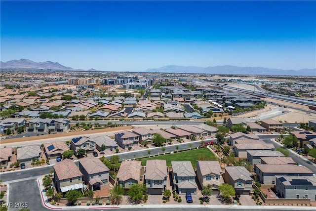 9136 Cocowoods Pl, Las Vegas, NV 89148 - aerial perspective of suburban area featuring a mountainous background