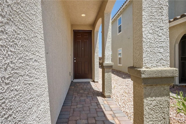 9136 Cocowoods Pl, Las Vegas, NV 89148 - entrance to property featuring stucco siding