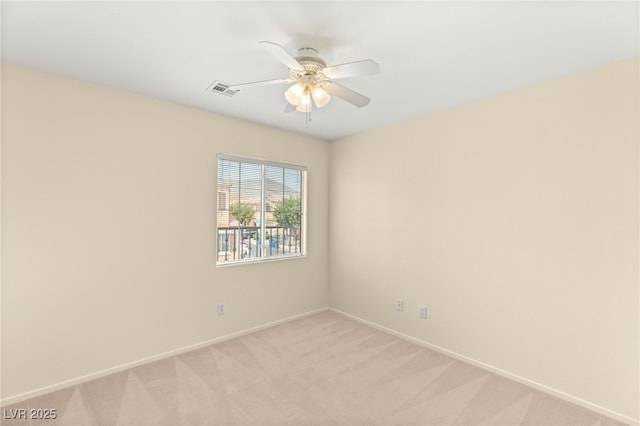 10437 Coyote Cub Ave, Las Vegas, NV 89129 - unfurnished room featuring light colored carpet and ceiling fan