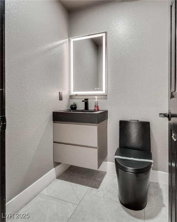 825 Royal Moon Ave, Las Vegas, NV 89123 - bathroom featuring vanity and baseboards
