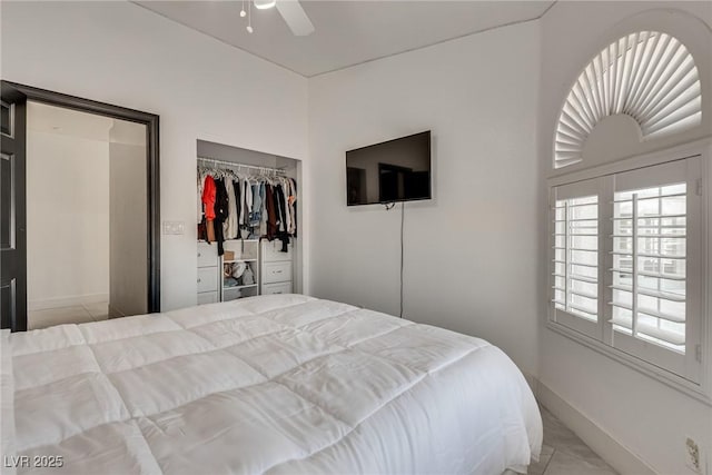 825 Royal Moon Ave, Las Vegas, NV 89123 - bedroom with a closet, a ceiling fan, and light tile patterned flooring