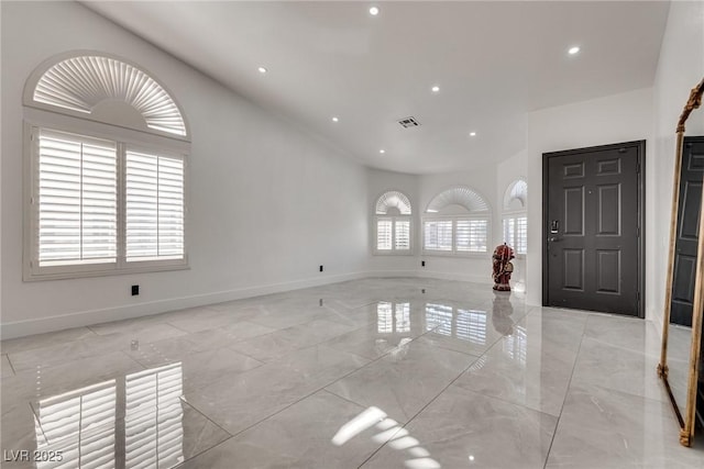 825 Royal Moon Ave, Las Vegas, NV 89123 - entryway featuring light marble finish floors, recessed lighting, and vaulted ceiling