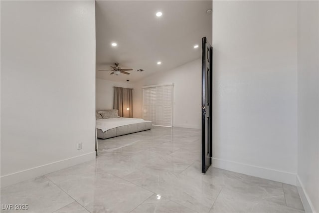 825 Royal Moon Ave, Las Vegas, NV 89123 - unfurnished bedroom with light marble finish floors, recessed lighting, and vaulted ceiling