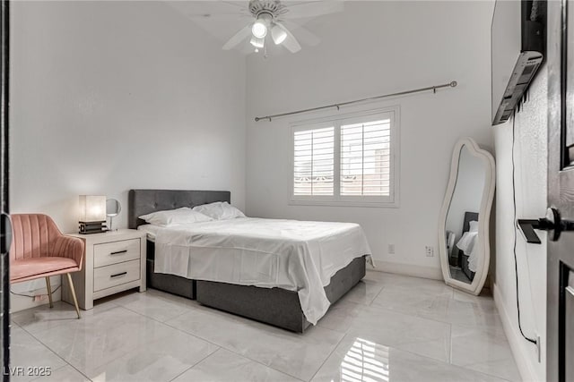 825 Royal Moon Ave, Las Vegas, NV 89123 - bedroom featuring light marble finish floors, a towering ceiling, and ceiling fan