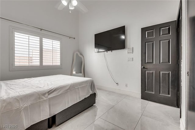 825 Royal Moon Ave, Las Vegas, NV 89123 - bedroom featuring ceiling fan and marble finish flooring