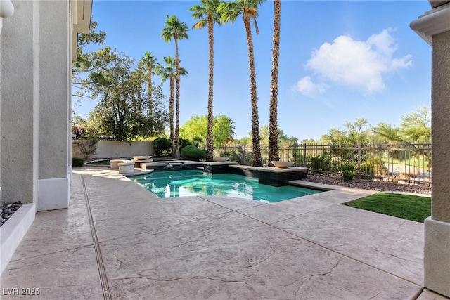 9408 Players Canyon Ct, Las Vegas, NV 89144 - view of pool with a patio, a fenced backyard, and a pool with connected hot tub