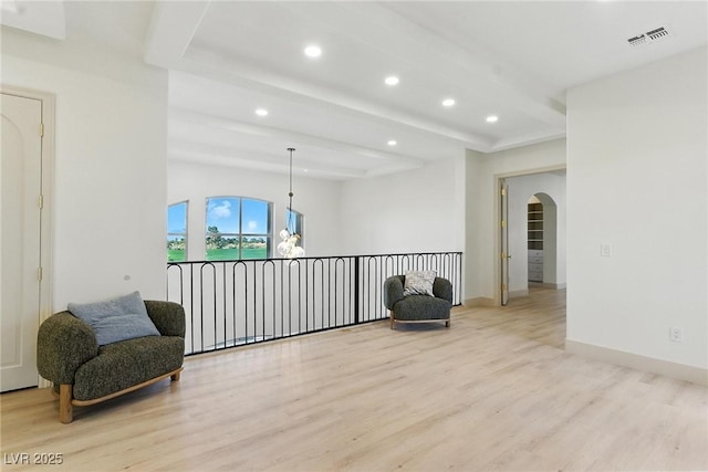 9408 Players Canyon Ct, Las Vegas, NV 89144 - sitting room featuring recessed lighting, light wood-style floors, arched walkways, and beamed ceiling