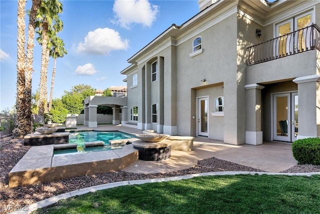 9408 Players Canyon Ct, Las Vegas, NV 89144 - patio / terrace with a patio area, an outdoor pool, and an in-ground hot tub