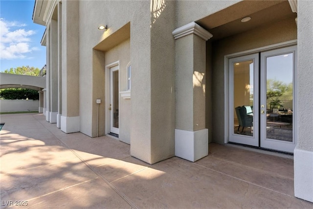 9408 Players Canyon Ct, Las Vegas, NV 89144 - view of patio / terrace featuring french doors