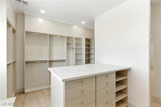 9408 Players Canyon Ct, Las Vegas, NV 89144 - walk in closet with light wood finished floors