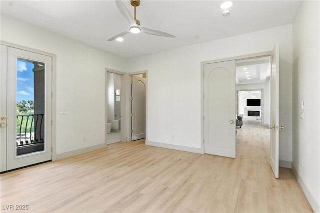9408 Players Canyon Ct, Las Vegas, NV 89144 - unfurnished bedroom with access to outside, light wood-type flooring, ensuite bath, and ceiling fan