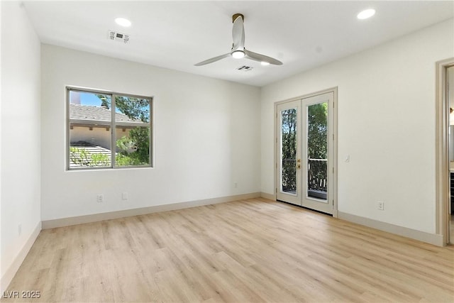 9408 Players Canyon Ct, Las Vegas, NV 89144 - unfurnished room featuring plenty of natural light, light wood finished floors, french doors, recessed lighting, and a ceiling fan