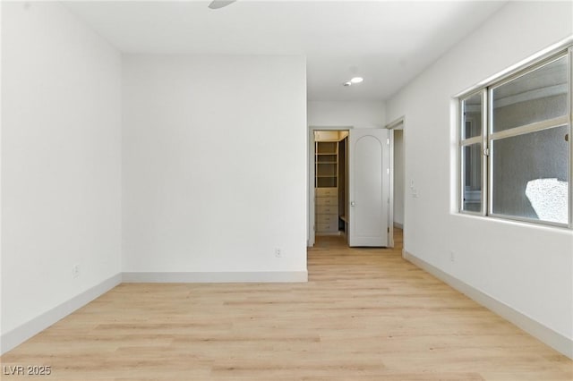 9408 Players Canyon Ct, Las Vegas, NV 89144 - empty room featuring wood finished floors and recessed lighting