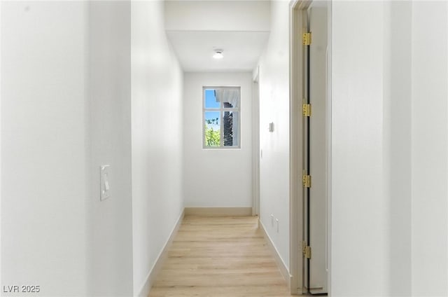 9408 Players Canyon Ct, Las Vegas, NV 89144 - corridor featuring light wood-style flooring and baseboards