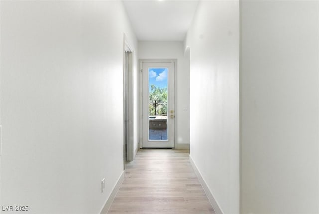 9408 Players Canyon Ct, Las Vegas, NV 89144 - hallway featuring baseboards and light wood-style floors