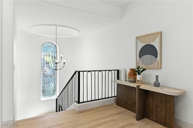 9408 Players Canyon Ct, Las Vegas, NV 89144 - stairway featuring a chandelier and wood finished floors