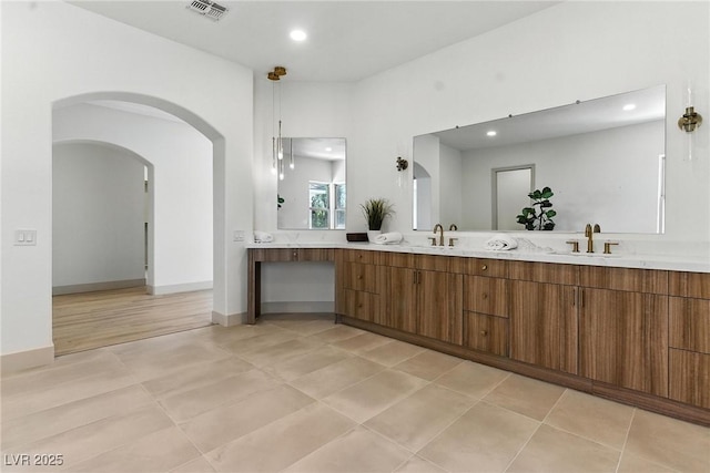 9408 Players Canyon Ct, Las Vegas, NV 89144 - bathroom featuring double vanity, recessed lighting, and tile patterned flooring