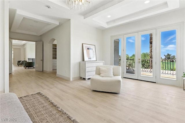 9408 Players Canyon Ct, Las Vegas, NV 89144 - sitting room with wood finished floors, arched walkways, recessed lighting, and a chandelier