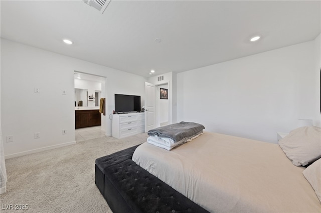 2732 Roman Palm Rd, North Las Vegas, NV 89086 - bedroom featuring light colored carpet, recessed lighting, and ensuite bathroom
