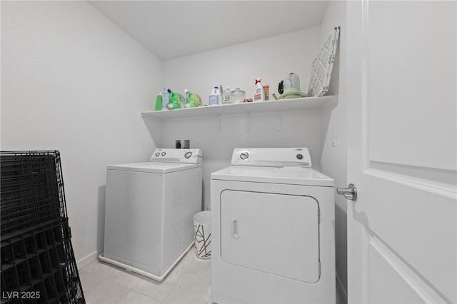 2732 Roman Palm Rd, North Las Vegas, NV 89086 - washroom with independent washer and dryer and light tile patterned flooring