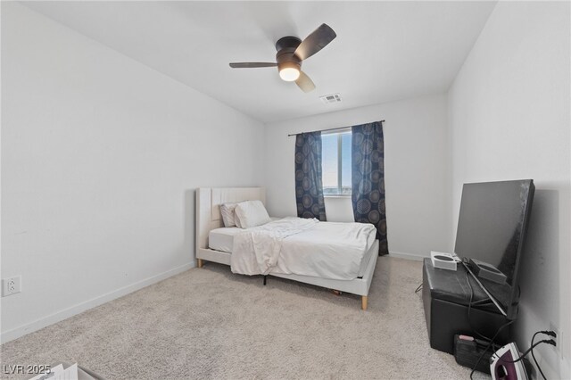 2732 Roman Palm Rd, North Las Vegas, NV 89086 - bedroom featuring light colored carpet and a ceiling fan