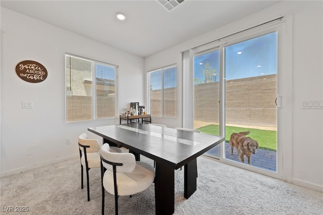 2732 Roman Palm Rd, North Las Vegas, NV 89086 - carpeted dining room featuring baseboards