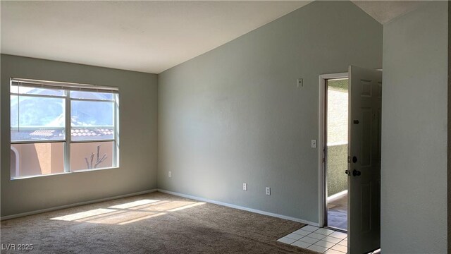 8101 W Flamingo Rd Unit 2110, Las Vegas, NV 89147 - carpeted spare room with baseboards and lofted ceiling