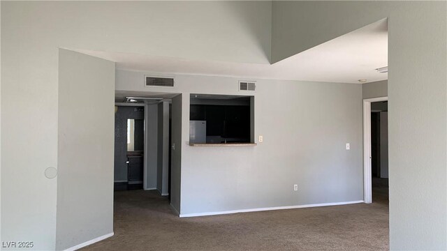 8101 W Flamingo Rd Unit 2110, Las Vegas, NV 89147 - carpeted empty room with baseboards