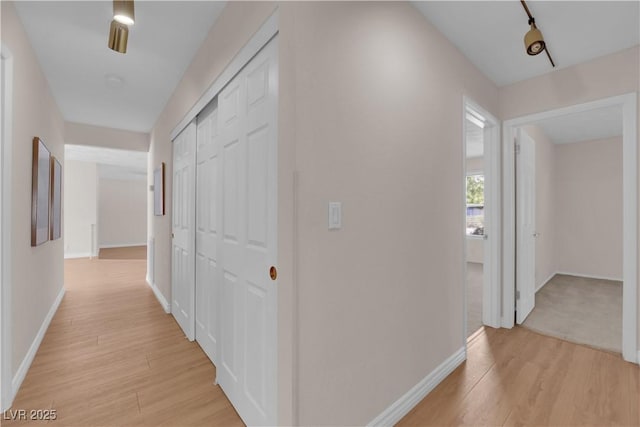 3753 Meadowcrest Dr, Las Vegas, NV 89121 - hallway with light wood finished floors and baseboards
