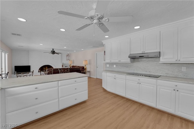 3753 Meadowcrest Dr, Las Vegas, NV 89121 - kitchen featuring ceiling fan, under cabinet range hood, open floor plan, light wood finished floors, and recessed lighting
