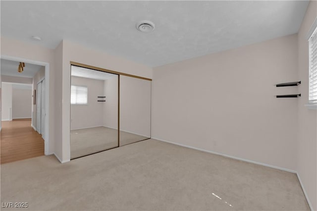 3753 Meadowcrest Dr, Las Vegas, NV 89121 - unfurnished bedroom featuring carpet and a closet