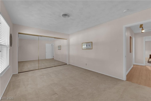 3753 Meadowcrest Dr, Las Vegas, NV 89121 - unfurnished bedroom with carpet floors and a closet