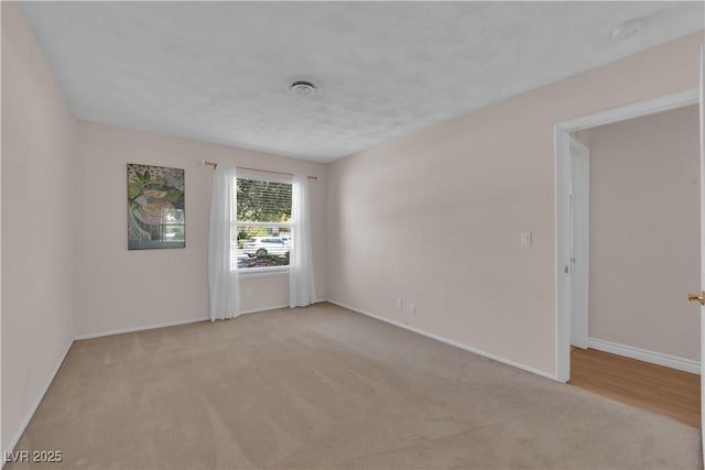 3753 Meadowcrest Dr, Las Vegas, NV 89121 - unfurnished room with light colored carpet and a smoke detector