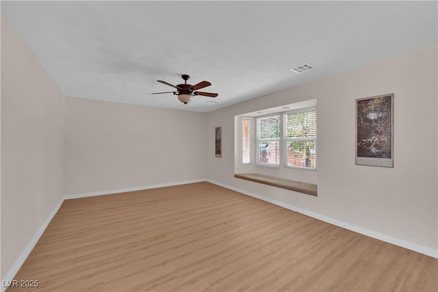 3753 Meadowcrest Dr, Las Vegas, NV 89121 - empty room featuring light wood finished floors and a ceiling fan