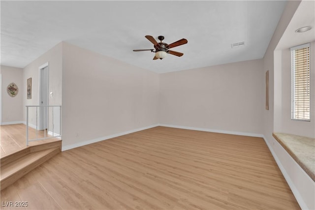 3753 Meadowcrest Dr, Las Vegas, NV 89121 - empty room featuring light wood-style floors and ceiling fan