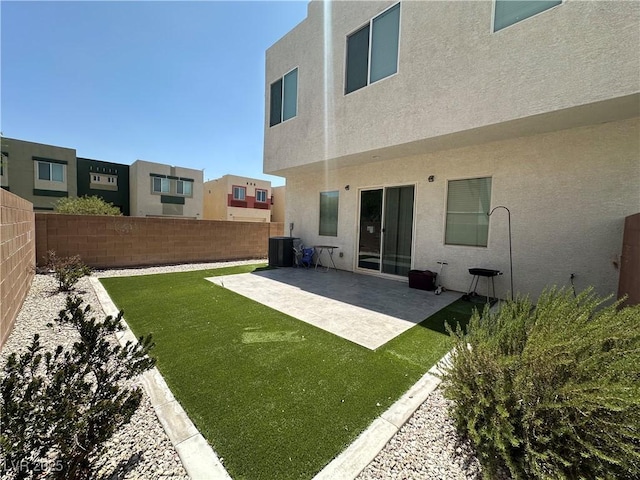 6450 Cinnamon Hazlenut St, North Las Vegas, NV 89084 - fenced backyard featuring a patio area