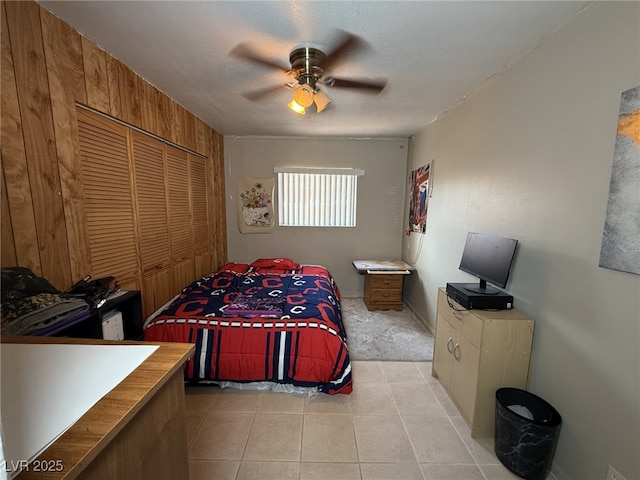 4567 S Nellis Blvd, Las Vegas, NV 89121 - bedroom featuring light tile patterned floors, a ceiling fan, and a closet