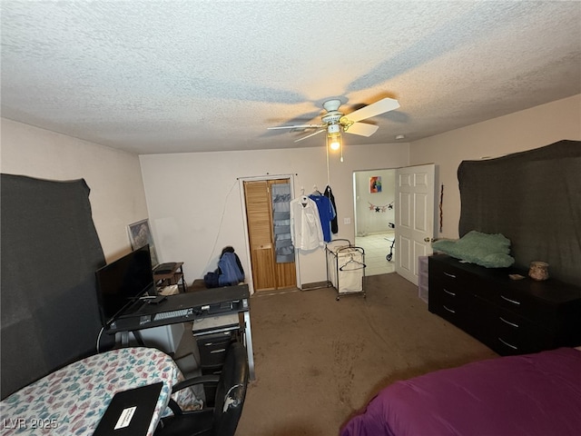 4567 S Nellis Blvd, Las Vegas, NV 89121 - carpeted bedroom featuring a textured ceiling and a ceiling fan