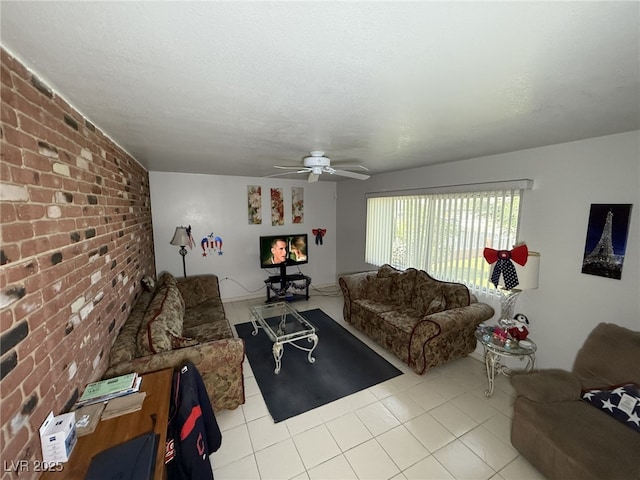 4567 S Nellis Blvd, Las Vegas, NV 89121 - living room featuring brick wall, tile patterned floors, and a ceiling fan