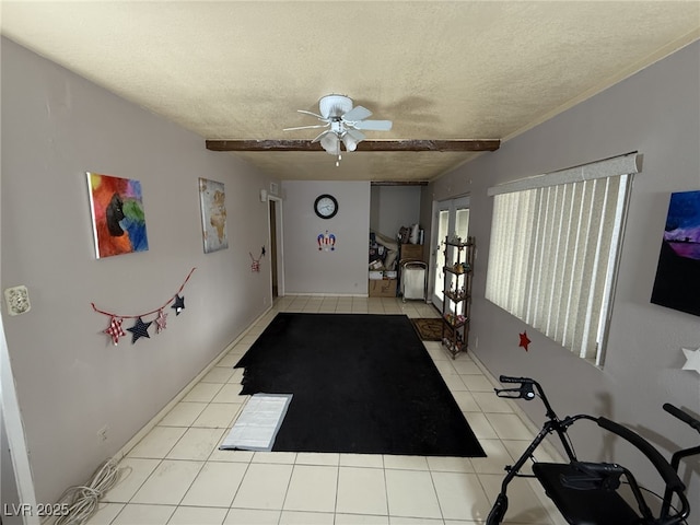 4567 S Nellis Blvd, Las Vegas, NV 89121 - workout room with tile patterned floors, a textured ceiling, and ceiling fan