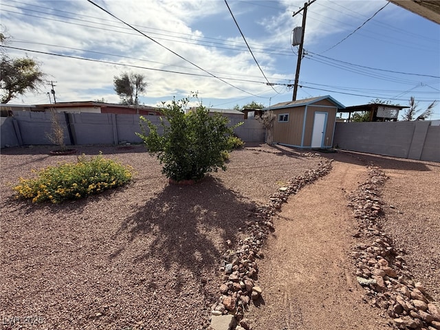 4567 S Nellis Blvd, Las Vegas, NV 89121 - fenced backyard with a shed
