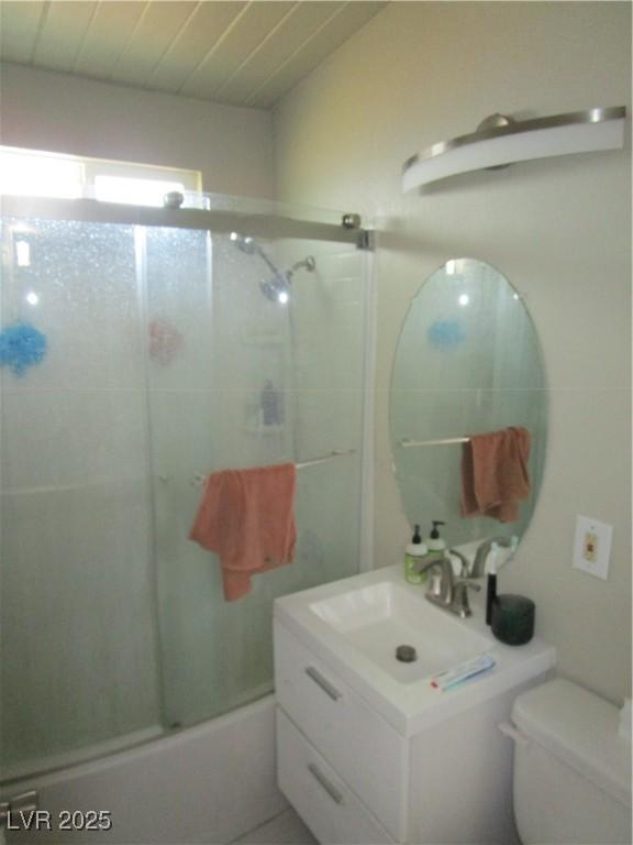 6409 Burgundy Way, Las Vegas, NV 89107 - bathroom featuring vanity and shower / bath combination with glass door