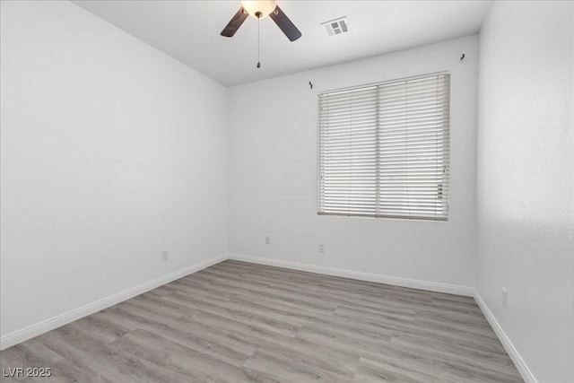 820 Peach Ave, North Las Vegas, NV 89032 - empty room with ceiling fan and wood finished floors
