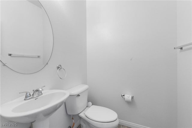 820 Peach Ave, North Las Vegas, NV 89032 - half bath featuring a sink and toilet