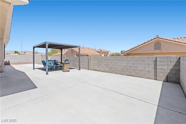 820 Peach Ave, North Las Vegas, NV 89032 - fenced backyard featuring a patio and outdoor dining area