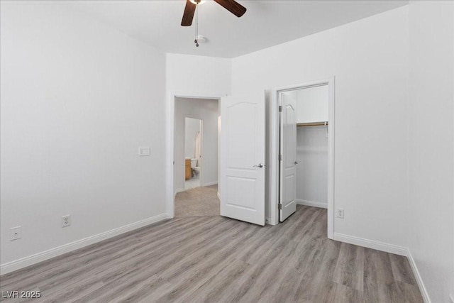 820 Peach Ave, North Las Vegas, NV 89032 - unfurnished bedroom featuring wood finished floors, a ceiling fan, and a closet