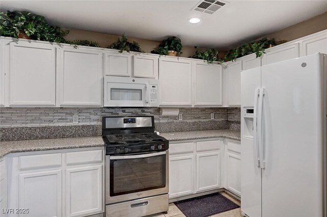 967 Coronado Peak Ave, Las Vegas, NV 89183 - kitchen with white appliances, white cabinets, light countertops, and recessed lighting